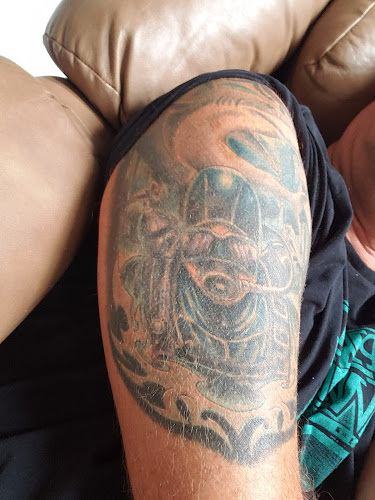 Golden Wave Tattoo Co.
